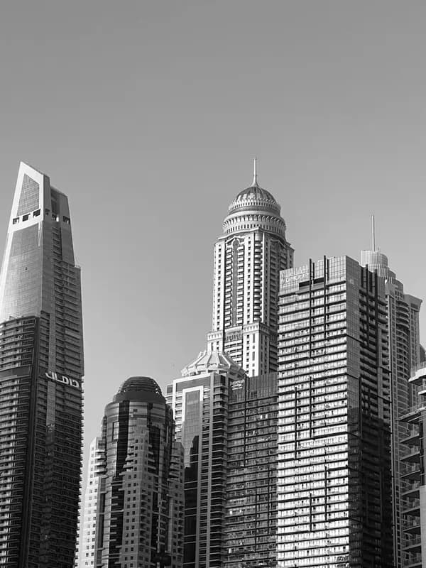 City skyscrapers rising into the sky, black and white