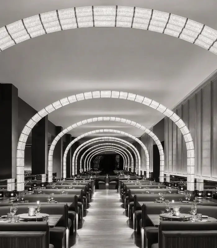 Restaurant dining room with arched ceilings, black and white